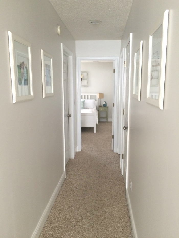 Painting trim is a great way to update a dark hallway. Love these tips!