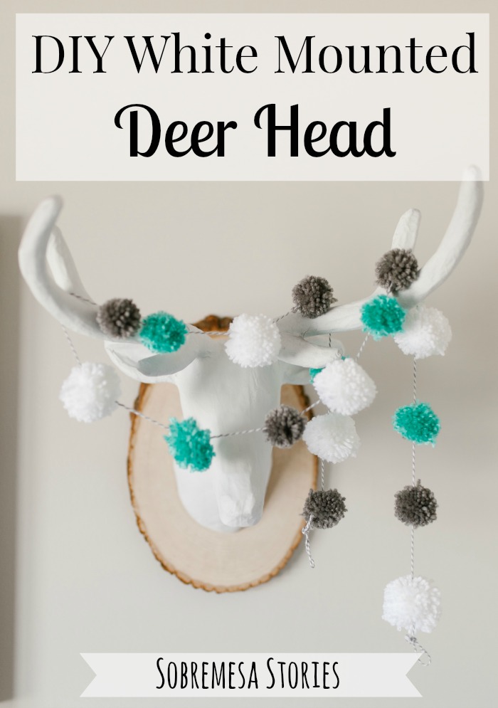This easy DIY white mounted deer head is SO easy to make and would look cute in any room!