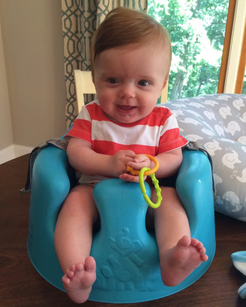Caleb's Five Month Update Bumbo Smile